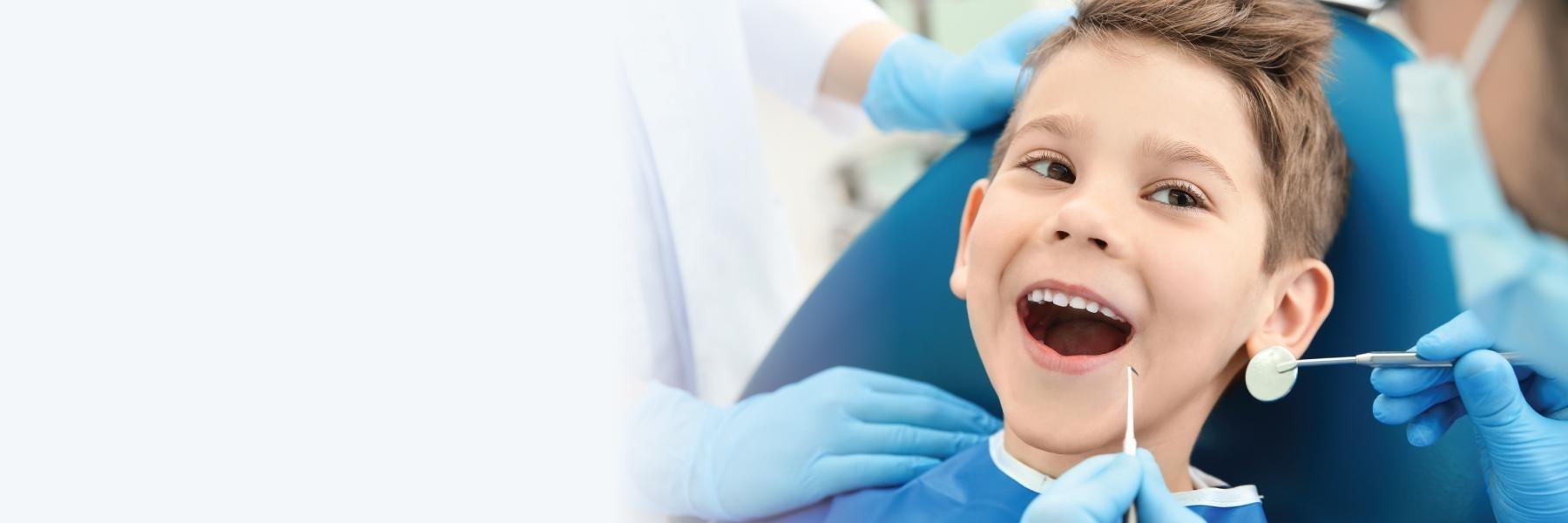 Kid undergoing dental examination in Elk Grove Village, IL