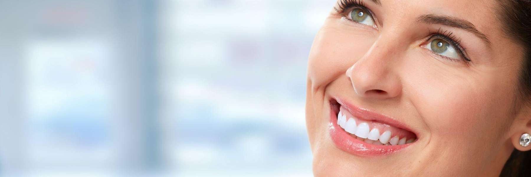 A woman smiling after Dental Bridge in Elk Grove Village