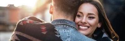 Couple embracing after teeth cleaning at Elk Grove Smile Center