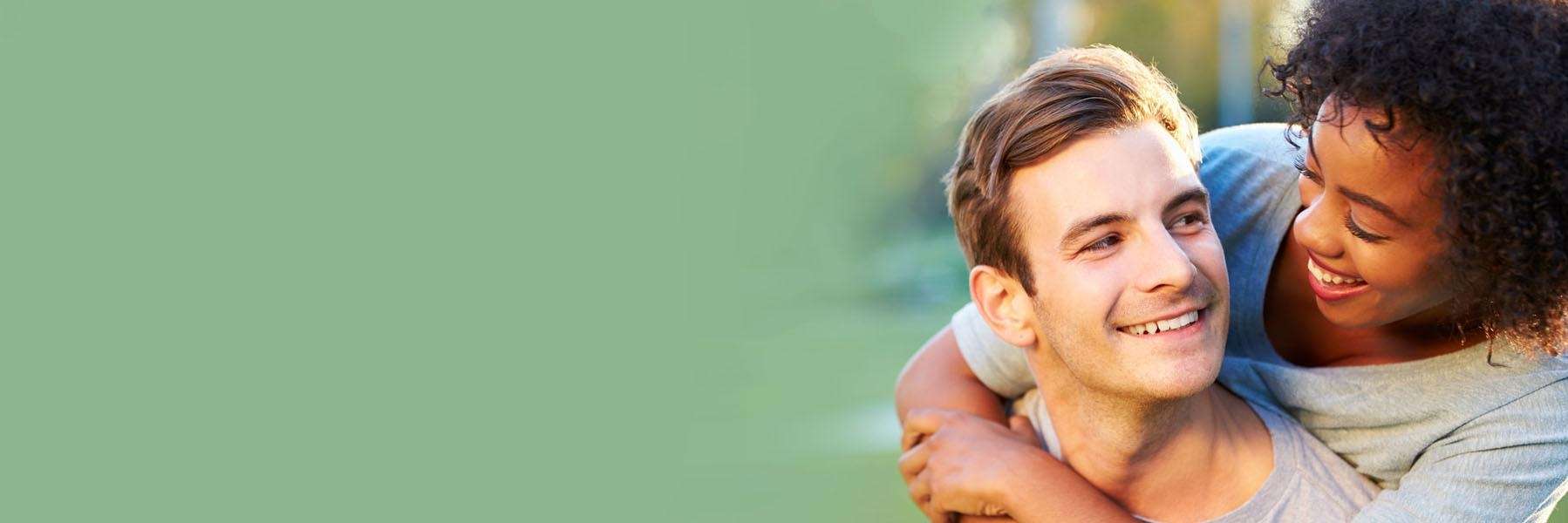 Couple smiling after dental bridge fillings at Elk Grove Smile Center